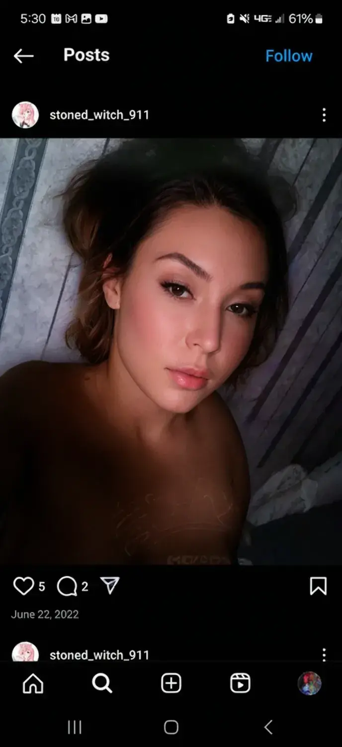 Pretty woman, wearing pink tank top, nipples, looking at me, smirking, lying in bed, selfie pov, ultra hd, realistic
