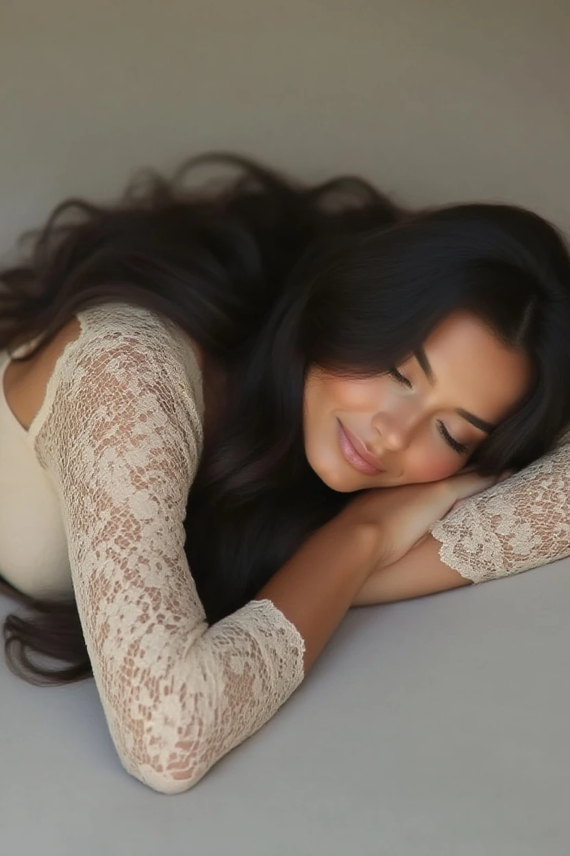 British lady with long black hair lying on bed, selfie