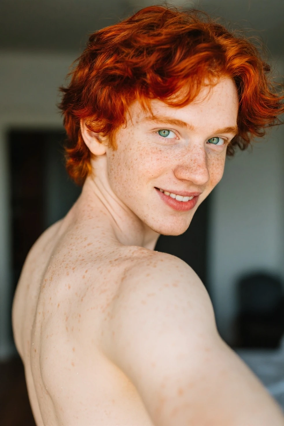 a young redhead with his hair parted in the middle, with penis to show