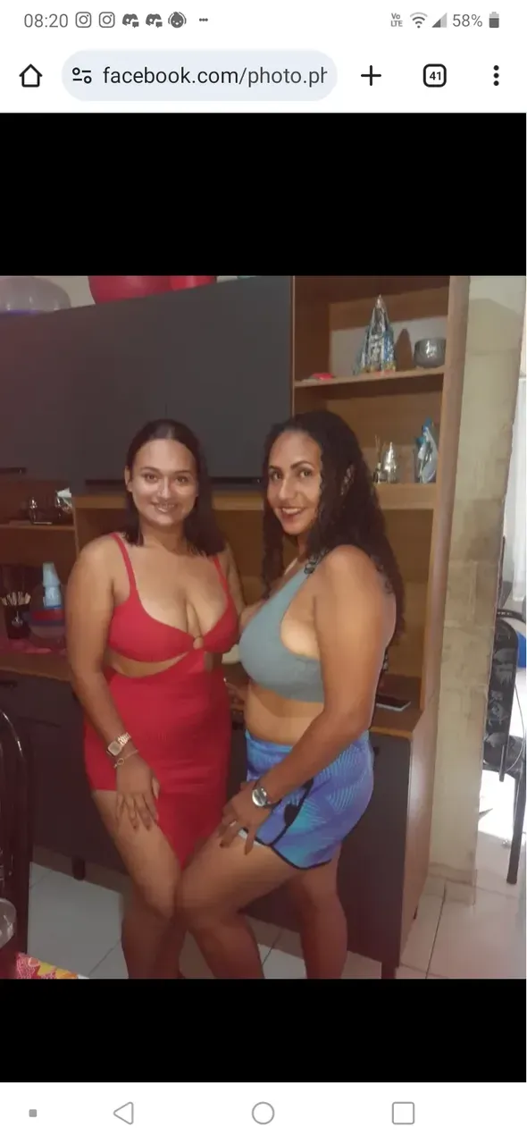 A mature Colombian women dressed in a lingerie teaching at a target store