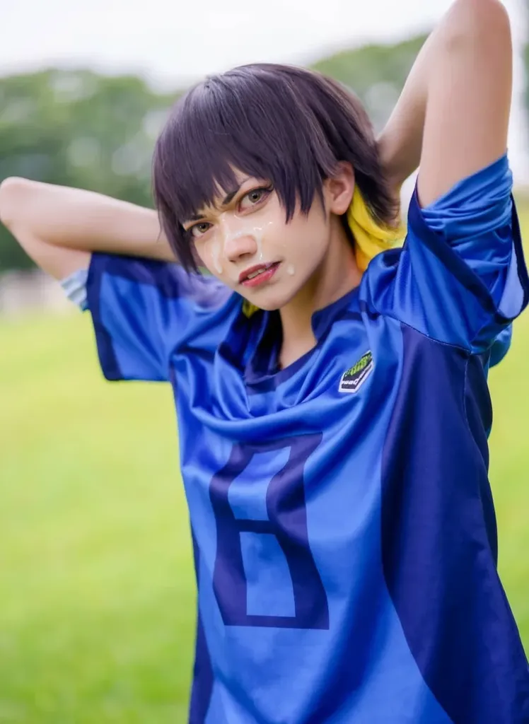 real looking japanese teenage boy, teal green eyes with long underlashes, dark green hair with bangs, lightly textured skin, wearing a red tank shirt for football on top of a black inner