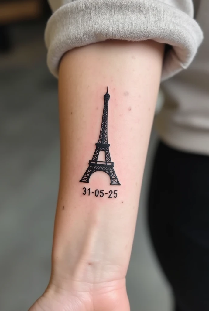 Make a real little tattoo featuring the name Baise moi Leon with the effel tower 