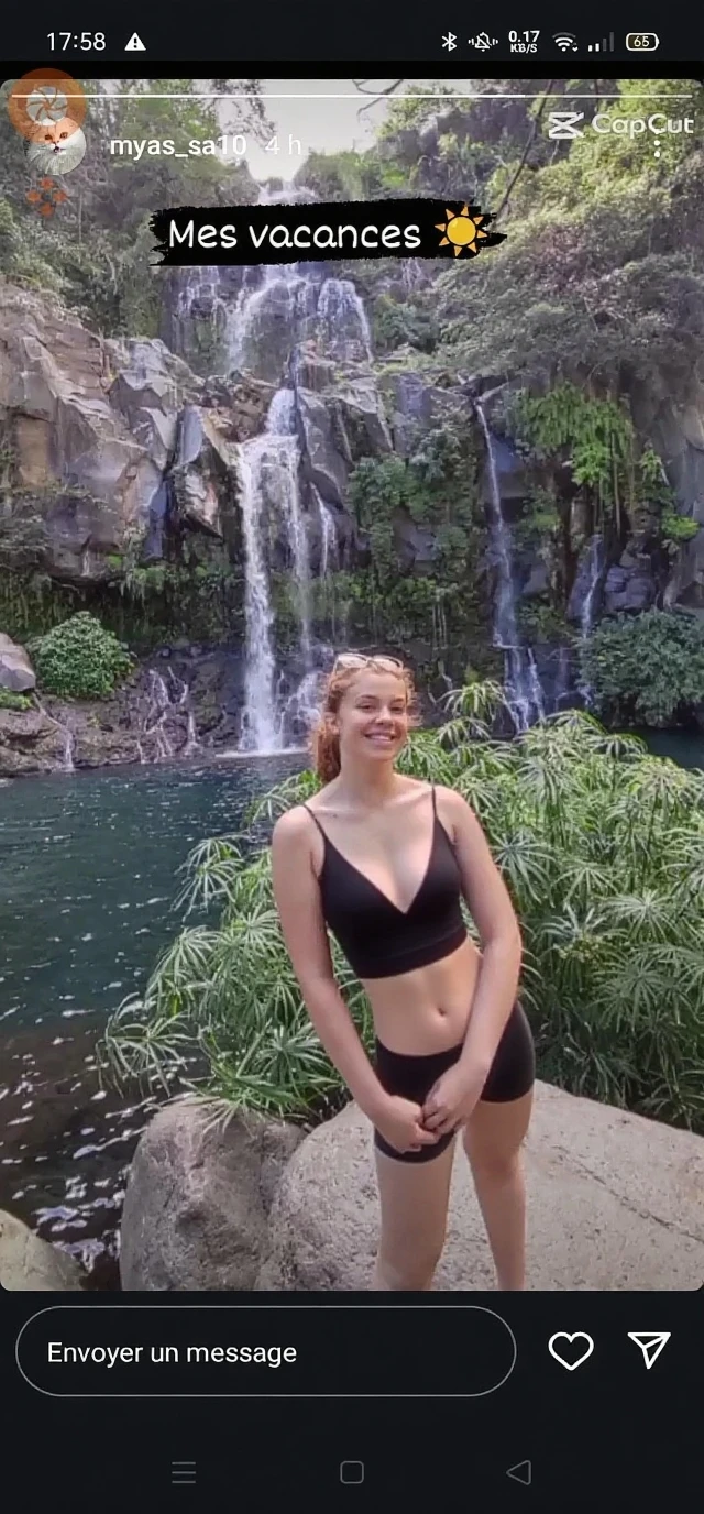 A captivating 25-year-old danish woman ,stands In the  Cave Pools: Pools inside caves with crystal-clear water and natural rock formations, reflecting the surrounding cityscape, like those in Berlin or Melbourne, with a full, voluptuous figure and notably large breasts, yet her body remains well-proportioned and appealing in her middle age. Her seductive appearance is enhanced by her blond hair and eyes .She has an ponytail hairstyle and has a seductive smile on her face, She wears colorfull patterned style clothes which includes patterned bikini with different color in such a way that her voluminous body is well highlighted and exposed and her face and figure are very attractive,cleavage visible is clear,viewed full body, very huge breasts
