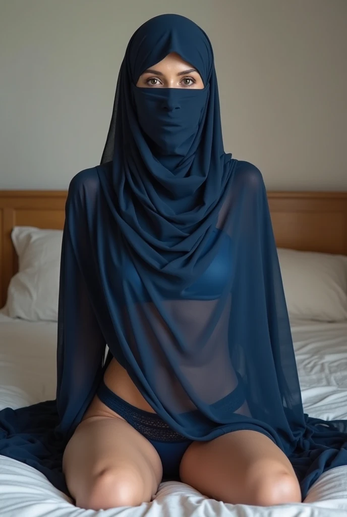 Arab mom with dark veil, on bed with phone