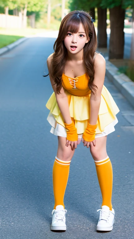 18-year-old cheergirl in orange miniskirt