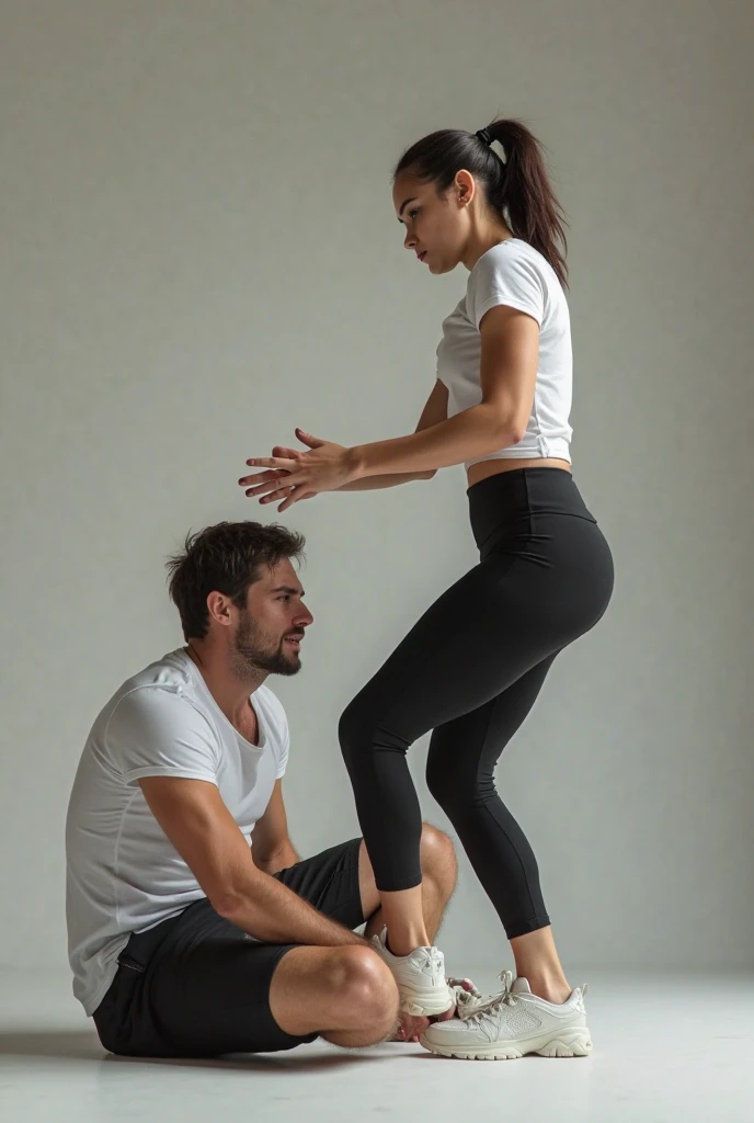 A sexy girl with leggings kicks a boy in the balls 
