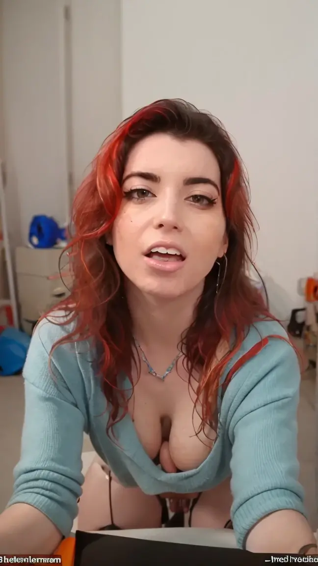 Horty, nude, from below, on all fours, in her room , looking at the camera