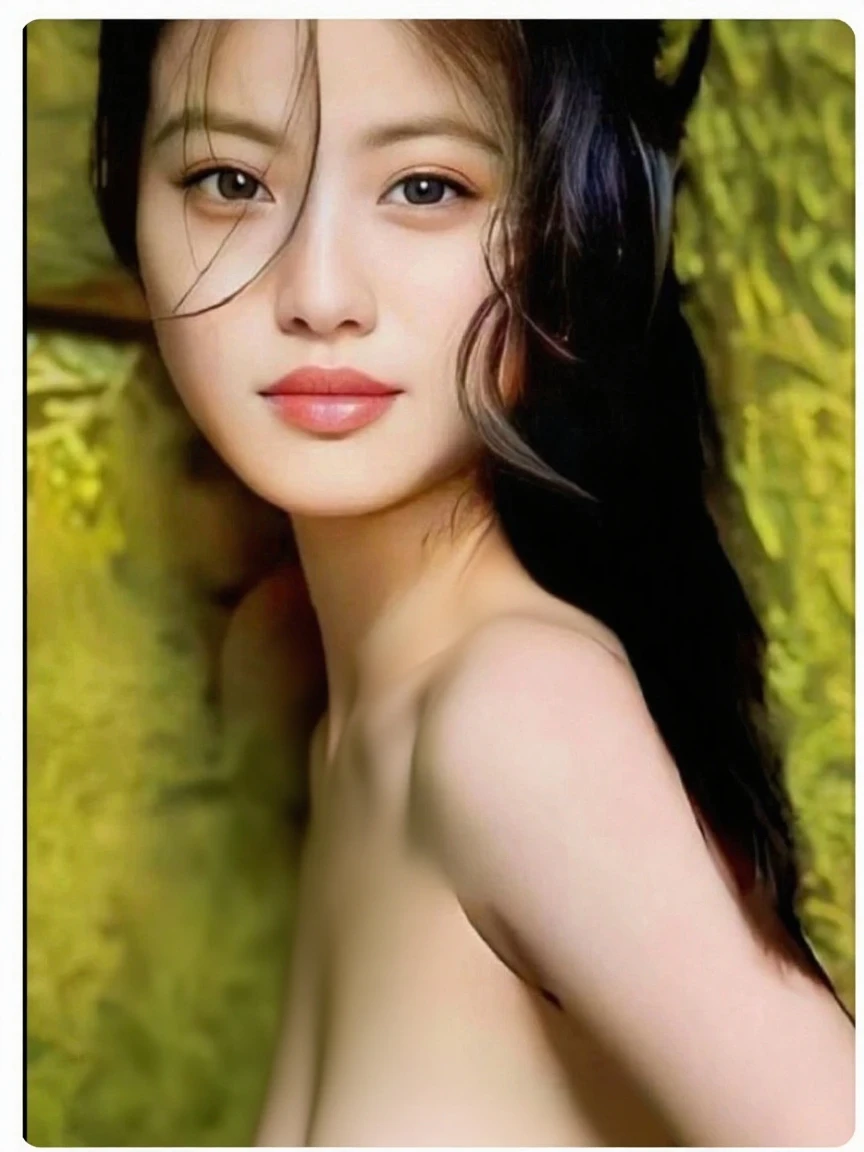 Fan Bing-bing under a cherry tree completely naked and smiling