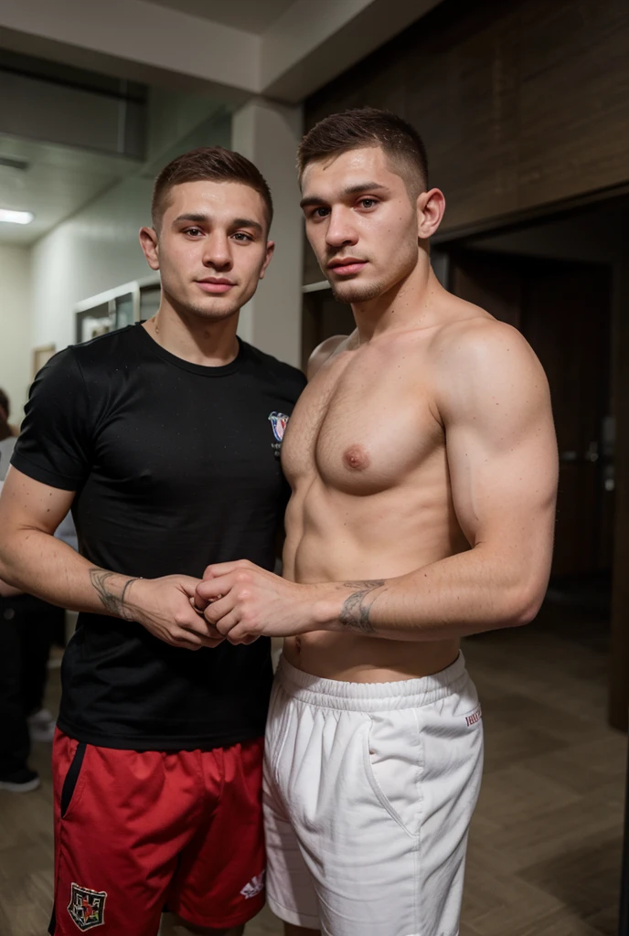 Caoimhín Agyarko and Rhys Edwards kiss in satin boxing trunks