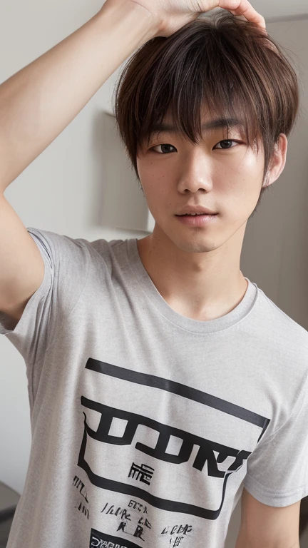 A young Asian man stands, handsome, muscular, looking at the camera. In a plain white t-shirt , Fieldside, grass, beach, sunlight