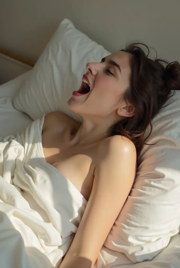 A cat crying with tears streaming down its face, lying on a bed