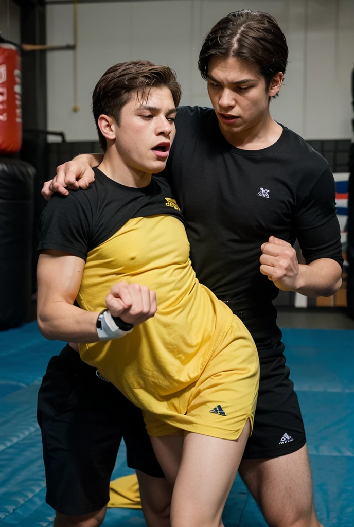 A very tall very fit young athlete wrestling back a very short skinny meager scared young man, at abandoned basement