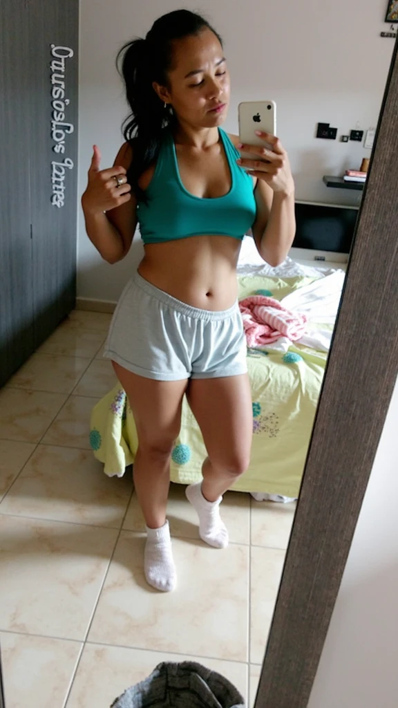 there is a woman sitting on a bed with a blue top, sport bra and dark blue shorts, hot teen girl, sport bra and shorts, in shorts, posing in a bedroom, hot , exposed thighs!!!, latina, (38 years old), sexy girl wearing shorts, side shot, 2 4 year old female model, photo of slim girl