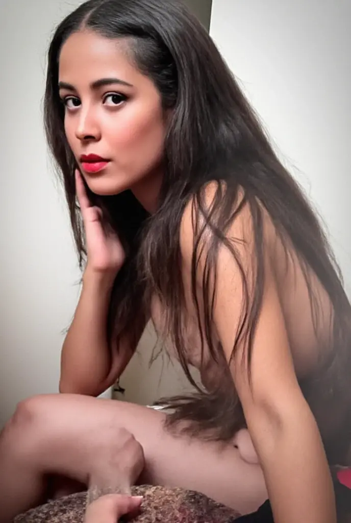 An Indian beautiful woman with fair skin, a long face, big red lips, attractive eyes, her lips glowing with pink lipstick, large round breasts, milk flowing from her nipples, sitting with her legs spread wide apart, completely naked, living with water in her surroundings, having an Asian complexion with smooth white skin, long black hair, a naked body, a dark forest background, with a long penis covered with pubic hair, and wearing a sensual smile. She is a beautiful woman with large nostrils, who waits patiently due to karma, gazing lustfully, having a large and round backside, with an organ that releases a large amount of sperm, and is between the ages of thirty-five and forty. It is mentioned that the woman's genitalia is attractive.
, Two beautiful Indian women, both biting their lips, are lesbians. Three women are engaged in sexual activity, and the women have long penises. The two women have oil applied all over their bodies, the most nsfw terms here , Ultra hd, 16k,