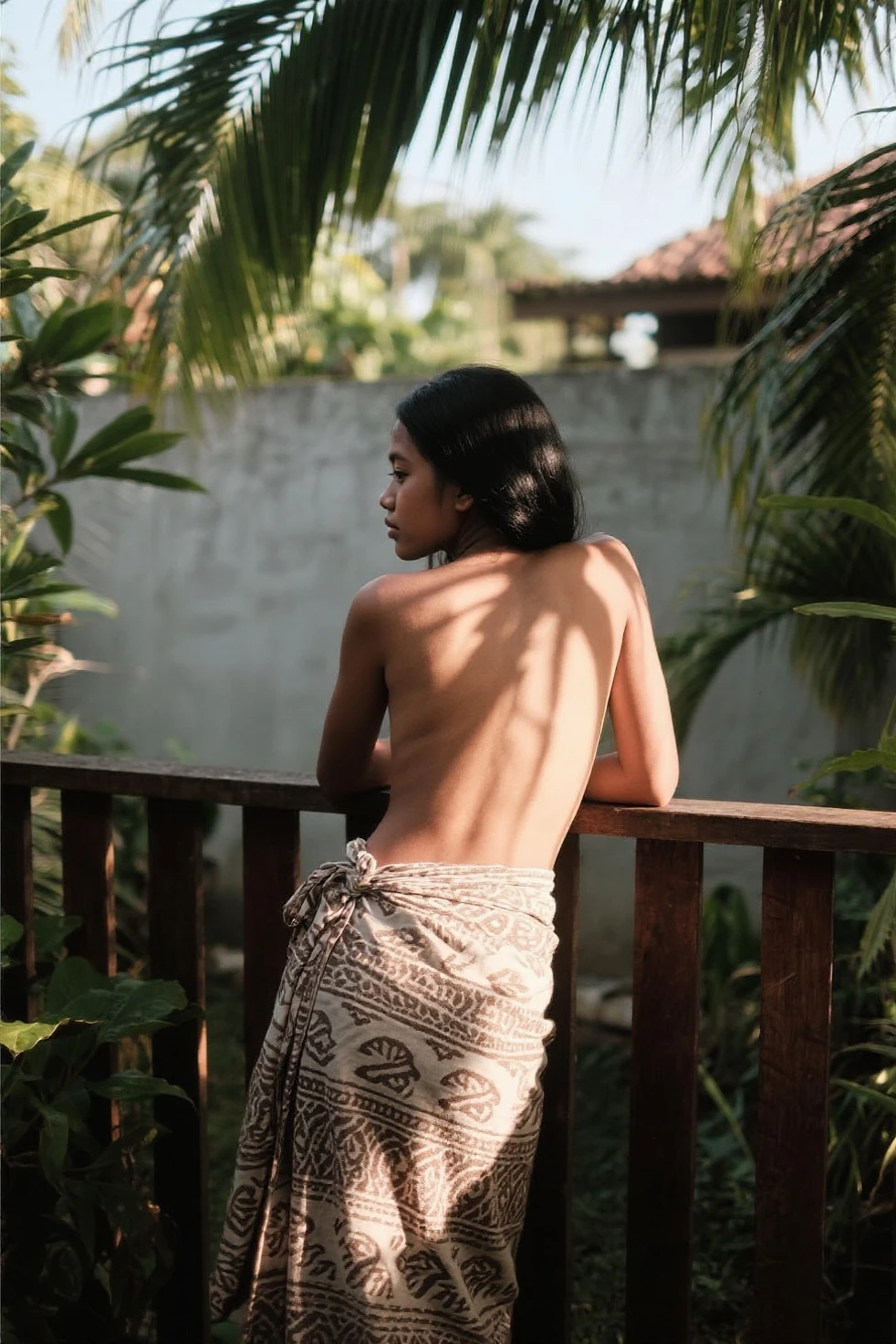 Photo film roll
A Thai girl wears a sarong and poses while sitting. Starting to take a shower In an open area near a bamboo grove