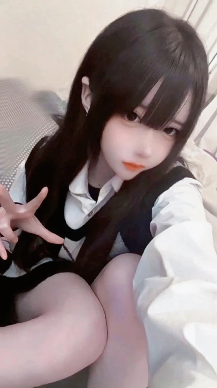 There is a woman sitting on the floor with her tongue out, anime girl Cosplay, anime Cosplay, Cosplay, professional Cosplay, Real life anime girls, hyperRealistic , a hyperRealistic , Realistic Cosplay, full-Cosplay, ayaka Cosplay, Enchanting anime girl, Inspired by anime, Realistic , Anime girl crouching, Black Pigtails