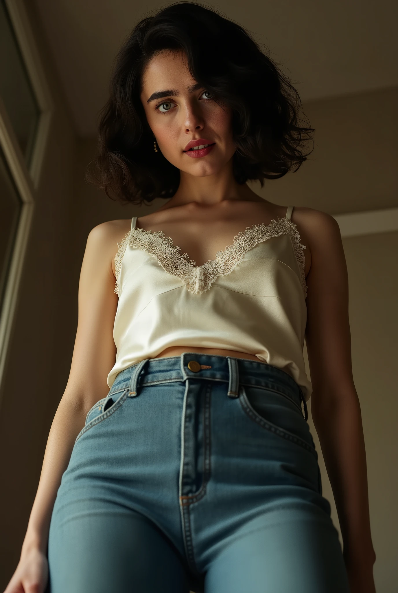 photorealistic portrait, extreme low-angle full-body shot from below the knees, looking up, making her appear towering and overpowering, dominant young woman standing over the viewer, radiating strict authority, intimidation, and psychological control, wearing an elegant ivory silk-satin camisole with delicate lace trim, no collar, no visible buttons, tucked into form-fitting high-waisted skinny jeans emphasizing her curves, piercing, unyielding gaze locked on the viewer, expression cold, stern, and menacing, body language rigid and precise, shoulders squared, chest slightly forward, posture perfect and assertive, hands with subtle tension, fingers poised to assert control, intimate framing pulling the viewer into her space, natural daylight casting dramatic highlights and shadows accentuating silk, lace, denim, and strict figure contours, minimal props, focus entirely on her dominance, strict authority, and magnetic, intimidating presence, cinematic, commanding, and unforgettable.