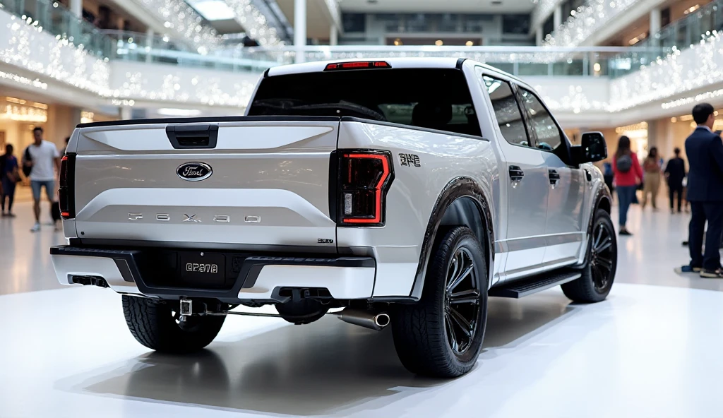 A photo of the back view of a SILVER 2026 FORD F-150 with a sleek ...