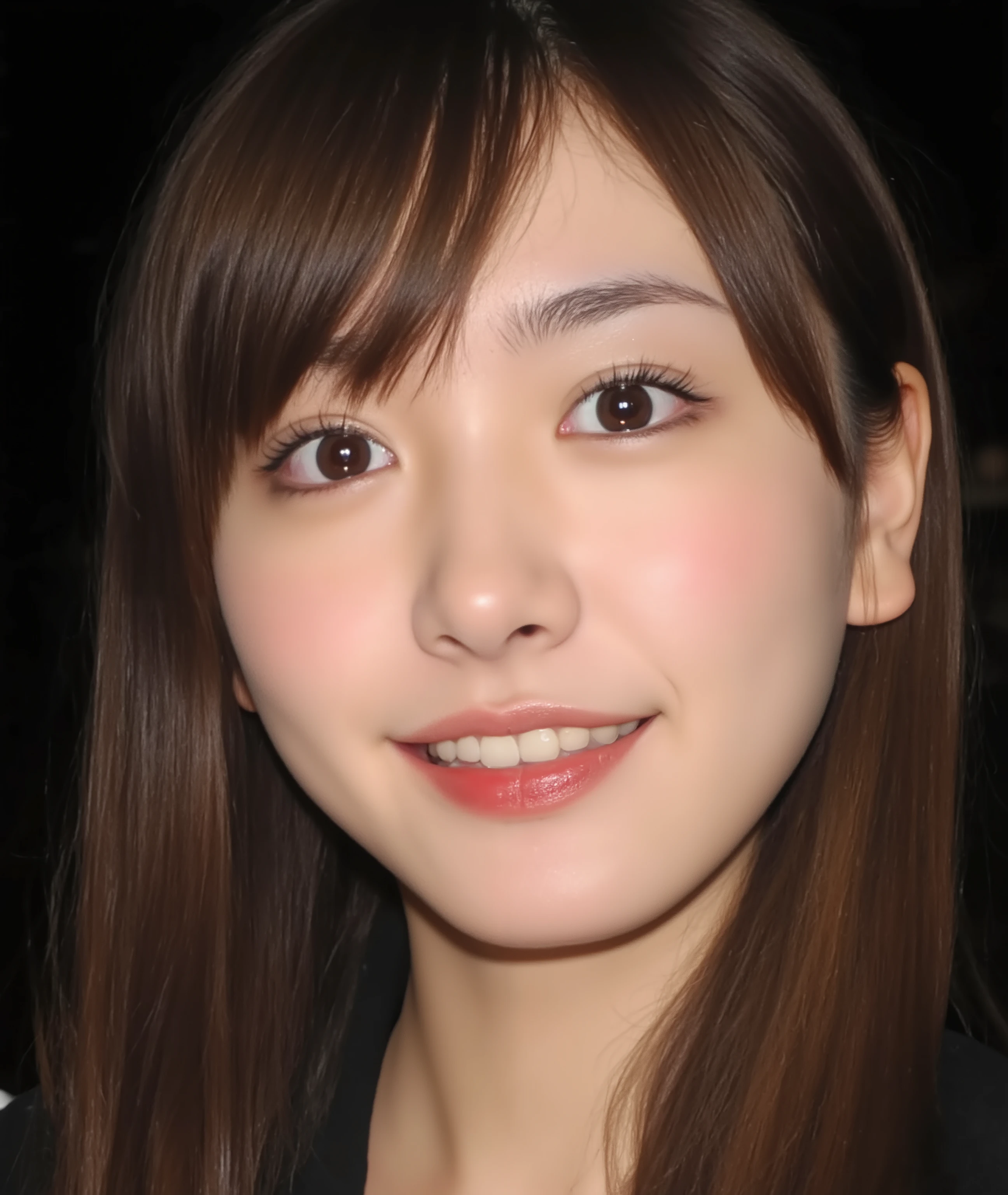 The image is a close-up photograph of a young Asian woman with a fair complexion. Her face dominates the frame, occupying the majority of the image, with her eyes, nose, and lips prominently visible. She has large, almond-shaped eyes with long, thick eyelashes, and her skin is smooth and soft. Her lips are full and slightly parted, revealing a natural, rosy hue. She wears a small silver stud earring in her left ear, adding a subtle touch of personal style.

Her hair is long, dark brown with subtle highlights, and it partially covers her forehead, giving a slightly tousled, casual look. The background is out of focus, but it appears to be a dark, possibly indoor setting, which emphasizes her face and provides a stark contrast to her light complexion. She is wearing a black garment, possibly a top or a sleeve, which is visible at the bottom of the image. The overall mood of the photograph is intimate and personal, capturing a candid moment with a natural, unfiltered aesthetic.