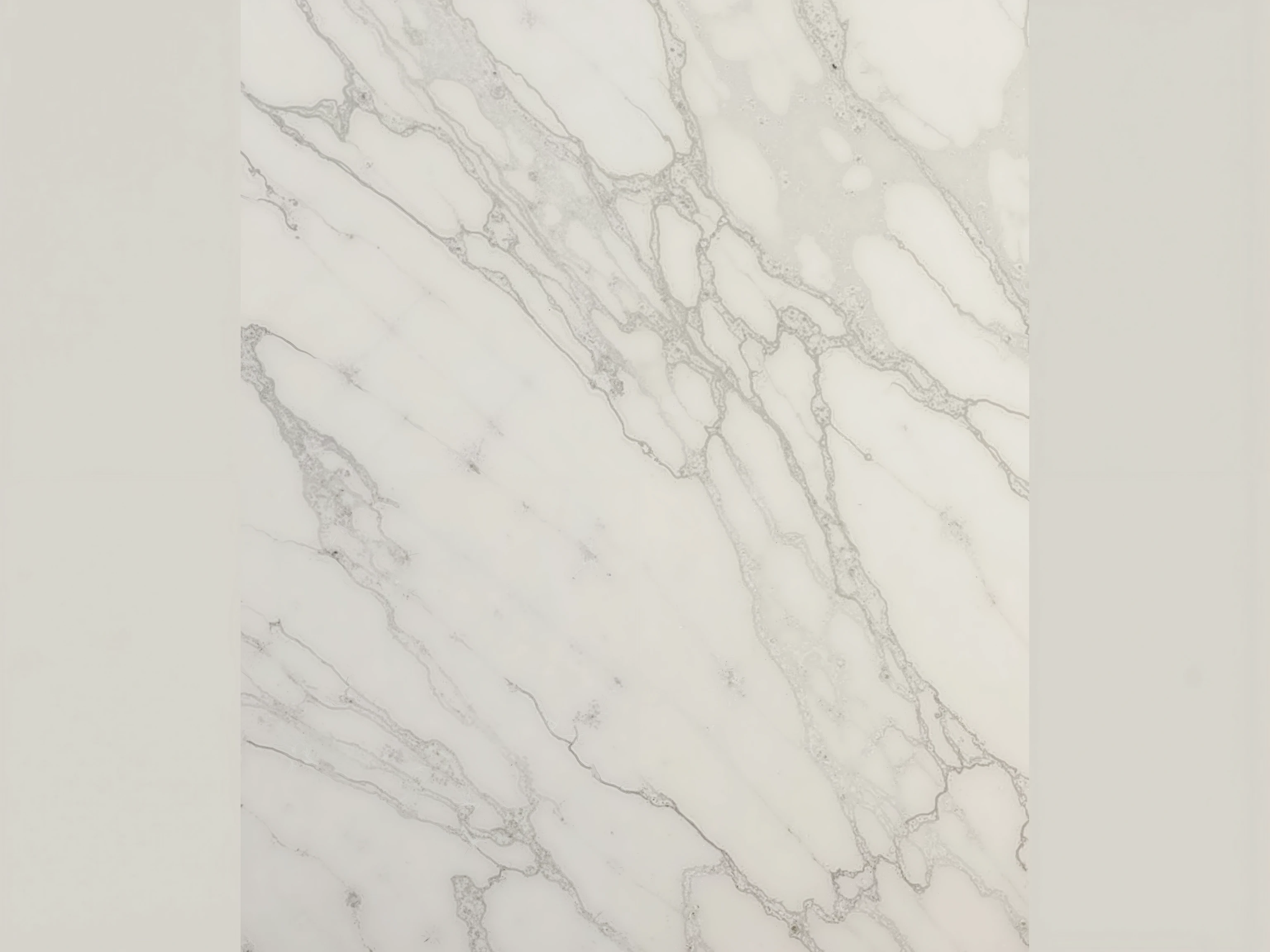 White marble texture with grey veins and cracks, marble has a slightly milky tint.
