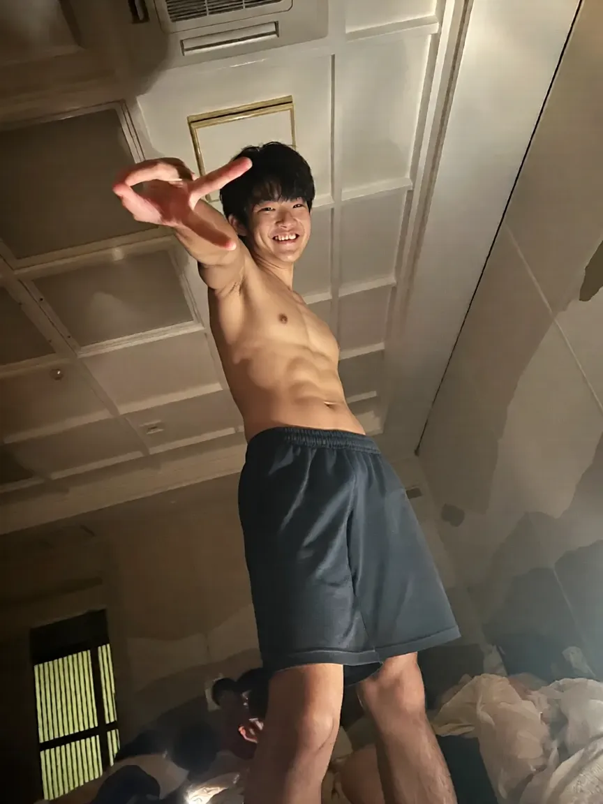 Two Japan Men、Both are 15 years old、Well-developed muscles and smooth skin、very short black hair、Relaxed and cheerful smile、colorful boxer briefs、Fist pump in the living room、The whole body is visible、Laughing with mouth open、