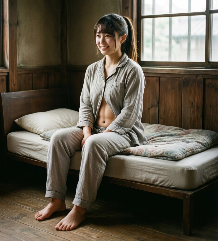 a Japanese young school girl holding a rectangular board, sitting on a blue bed