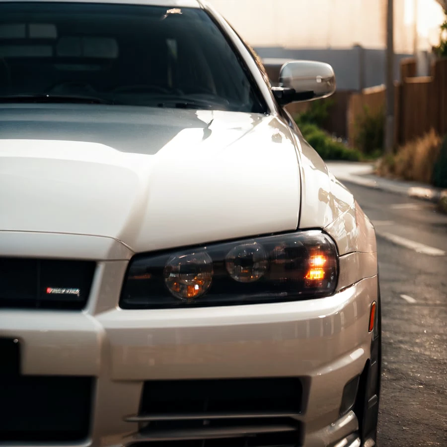 masterpiece,best quality, depth of field, (close-up:1.3), lens flare, cinematic lighting, absurdres,
car, car light,
<lora:skylineR34-000014:0.9>