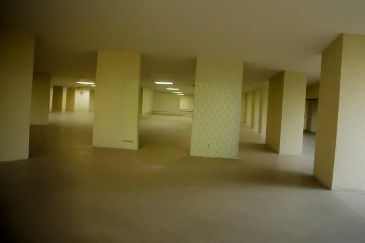 liminal, dreamlike, minimalist, empty, randomly segmented, things out of place, unexplained phenomena