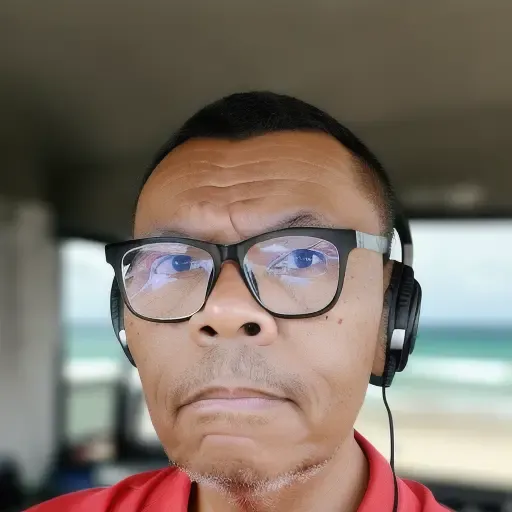 guttonerdvision2, ((Best quality)), ((Masterpiece)), ((Perfect character)) wearing headphones and sitting at a computer desk, face, half body, body, high detailed skin, skin pores, coastline, overcast weather, wind, waves, 8k uhd, dslr, soft lighting, high quality, film grain, Fujifilm XT3