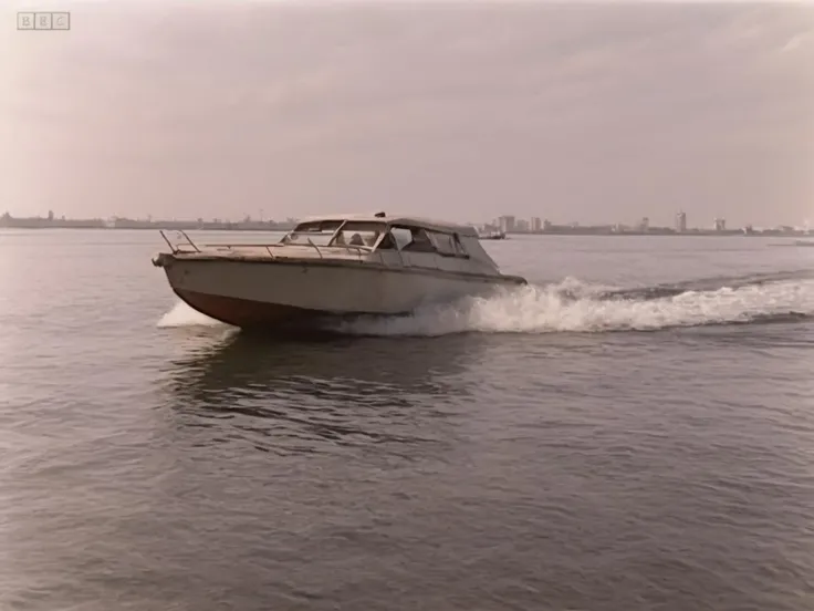 1990s film photograph of speedboat in russia <lora:TraumaZone:1.3>