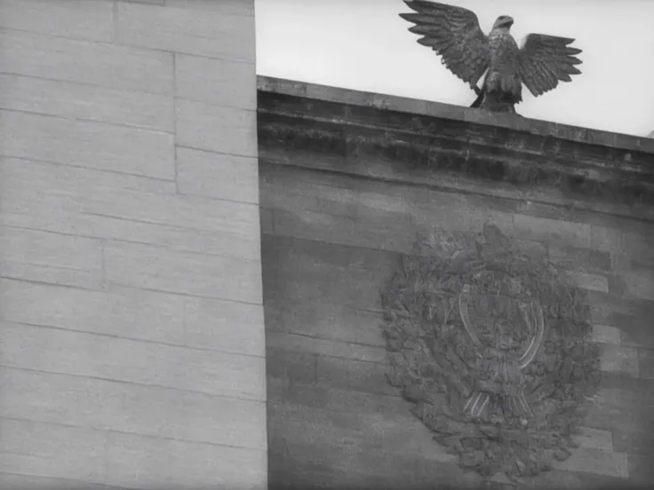 black and white photo of a stone eagle on a building <lora:XL_Leni_Riefenstahl_Style_-_Triumph_of_the_LoRA_XL:1.0>