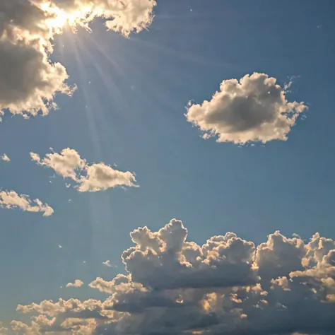 A mix of blue sky and clouds, with the sun peeking through at places.