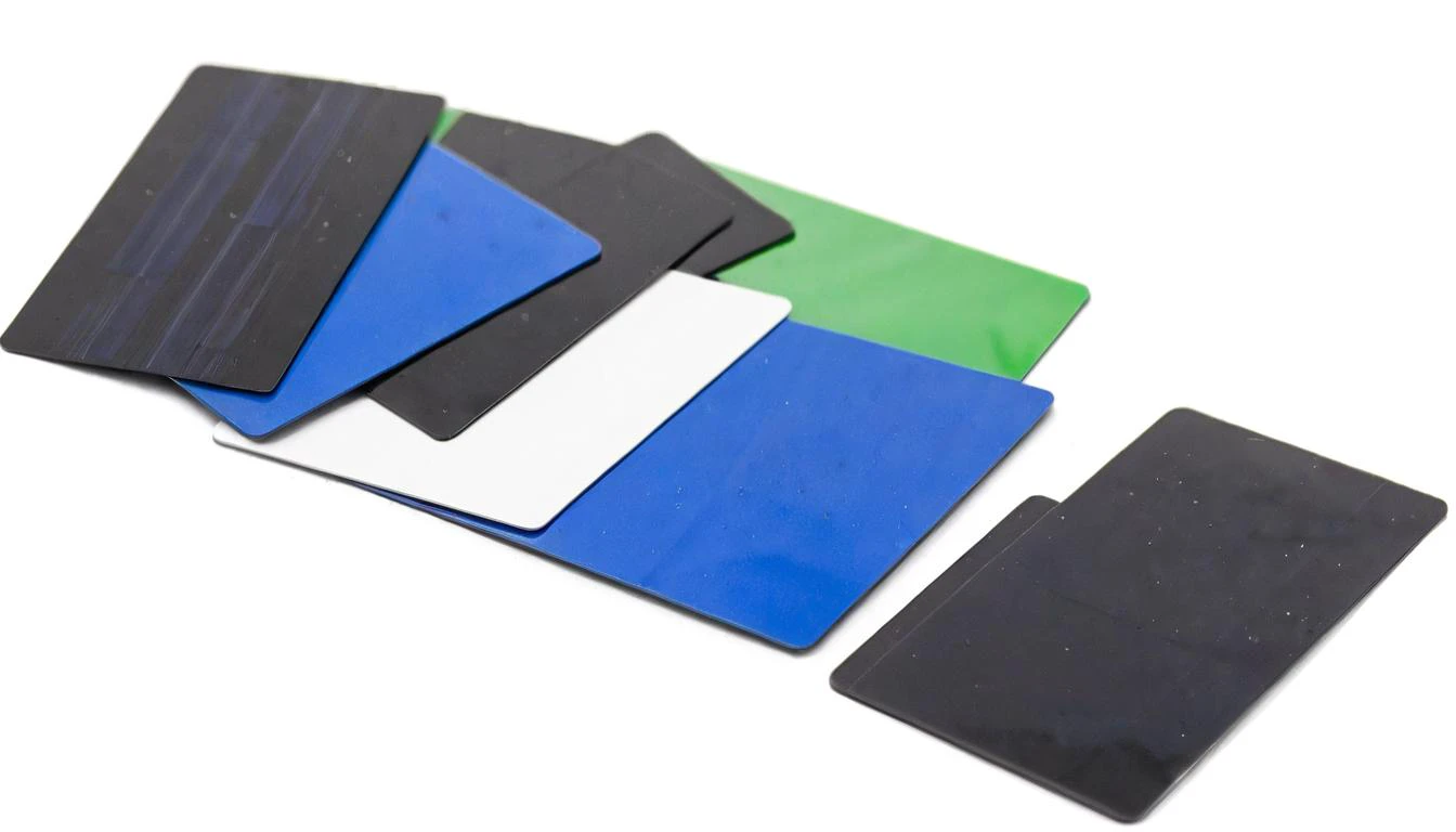 plastkort, the solar system (made from:1.3) single black blue white and green colored (rectangular plastic cards), <lora:Plastkort_2-000009:1>