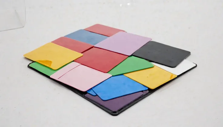 plastkort, a cake (made from:1.3) colored (rectangular plastic cards), <lora:Plastkort_2-000006:1>