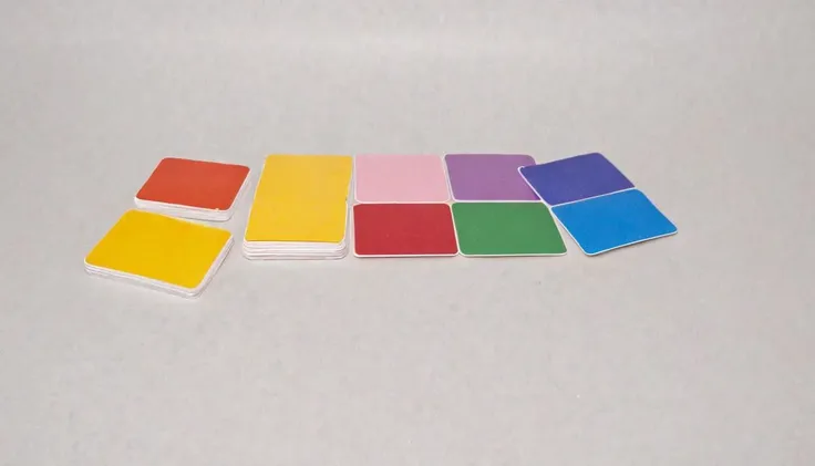 plastkort, a cake (made from:1.3) colored (rectangular plastic cards), <lora:Plastkort_epoch_8:1>