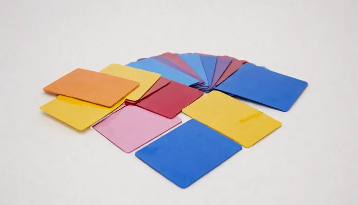 plastkort, a cake (made from:1.3) colored (rectangular plastic cards), <lora:Plastkort-000006:1>