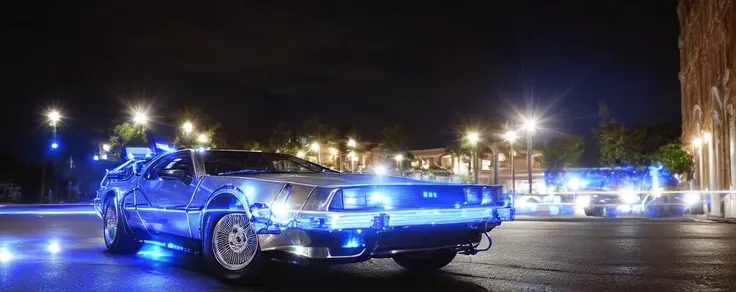 (low view:1.5) (medium shot:1.5) 4k high-res photo of a (((highly polished metallic chrome))) bttfdmc glowing blue, in a charming town square at night, sharp focus, ((shallow depth-of-field)), (bokeh), (lens flare), ((blue electric glow)), <lora:bttfdmc:0.8> <lora:Anamorphic lens flare:0.5>
