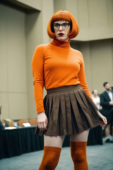 gorgeous candid gritty muted color raw portrait, (sfw) jewish 1girl, as a mad duchess, cosplaying as velma dinkley, gritty tulle velma dinkley outfit with (orange turtleneck sweater), (brown pleated mini skirt), (orange socks), (short ginger wig), glasses, indoors on stage in a grotesque gritty convention center, natural lighting, shadowy figures in the background, action pose, plastic fantastic, muted color raw photo, epic character composition, sharp focus, subsurface scattering, f2, 35mm, film grain