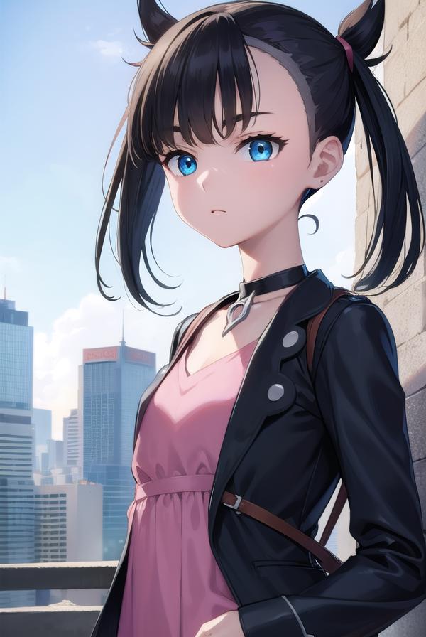 A woman in a pink dress and black jacket standing in front of a wall ...