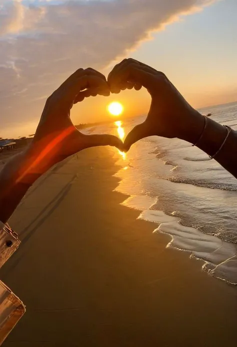 F-B-C, POV, foreground: two hands in the shape of a heart , background: sunset on the beach , effect: the sun is on the center of the heart
