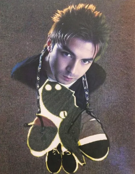 rock band frontmen poster, professional photo, 90sgum, y2kmad <lora:90sgum_v0.0.2-cap-e30:0.99> <lora:y2kmad_v0.0.2:0.35>
