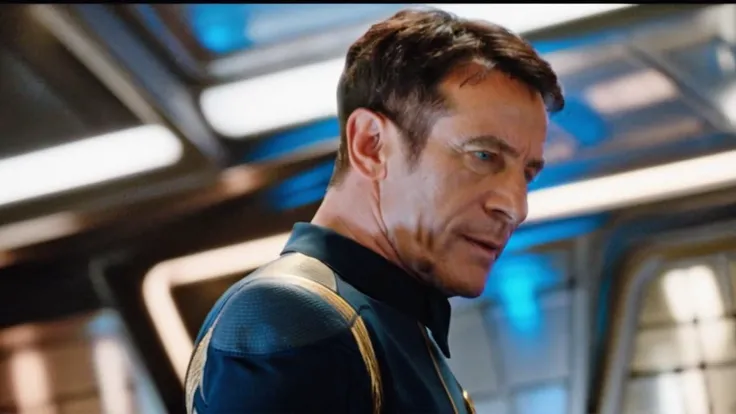 cinematic film still cinematic photo breathtaking <lora:captain_lorca_100x100-step00016000:1> lorca, man, shirt, blue, star trek . award-winning, professional, highly detailed . 35mm photograph, film, bokeh, professional, 4k, highly detailed . shallow depth of field, vignette, highly detailed, high budget Hollywood movie, bokeh, cinemascope, moody, epic, gorgeous, film grain, grainy