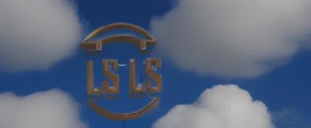warner bros logo in the sky with clouds