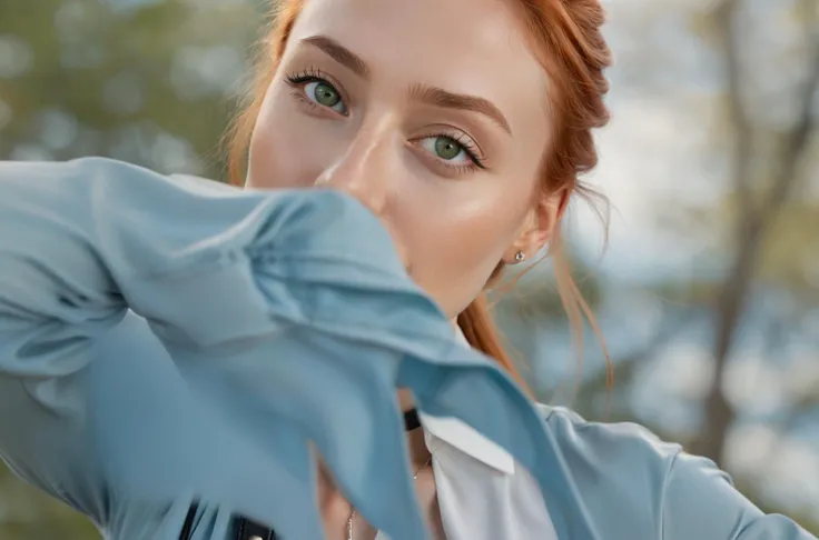 The image is a high-resolution photograph featuring a 21 year old woman with light skin and long, straight red hair that cascades past her shoulders. She has piercing green eyes. She is outdoors, with a blurred background of green foliage and blue sky, suggesting a natural setting. The woman has a slender physique and small, perky breasts with light pink areolas. She is topless, with her breasts exposed and toned abs. She wears a delicate silver necklace with a small cross pendant. Around her neck, she also has a black leather choker with a small, decorative pendant. Her body is clad in a black leather harness. Her expression is calm and confident, with a slight smile on her lips. The lighting is natural, highlighting the smooth texture of her skin and the softness of her hair. The photograph is likely taken during the daytime, indicated by the clear, bright sunlight. The overall mood is serene and intimate, focusing on the natural beauty of the subject and the outdoor setting.  The photograph aims to capture a natural, unfiltered portrayal of the subject in a candid, artistic manner. <lora:Detailed_nipples_xl:1> <lora:EleonoraV2:.4>