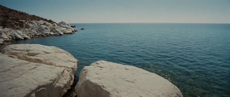 cinematic film still of <lora:Film Grain style:0.6> Film Grain:1 style
<lora:Kodak Motion Picture Film Style v4:0.4>
<lora:Chiaroscuro Lighting Style:0.6>
<lora:Ron Fricke style:0.4>
a view of a body of water with a lot of white rocks,outdoors,day,water,no humans,ocean,scenery,blue theme,underwater , realistic, realism, movie still, film grain, kodak film, film contrast, film color, cinematography, documentary, photography, 70 mm film, 65 mm film, Todd-AO, Todd-AO 35, 8K resolution, Ron Fricke film director style, Ron Fricke film directing style, Ron Fricke style, shallow depth of field, vignette, highly detailed, high budget, bokeh, cinemascope, moody, epic, gorgeous, film grain, grainy