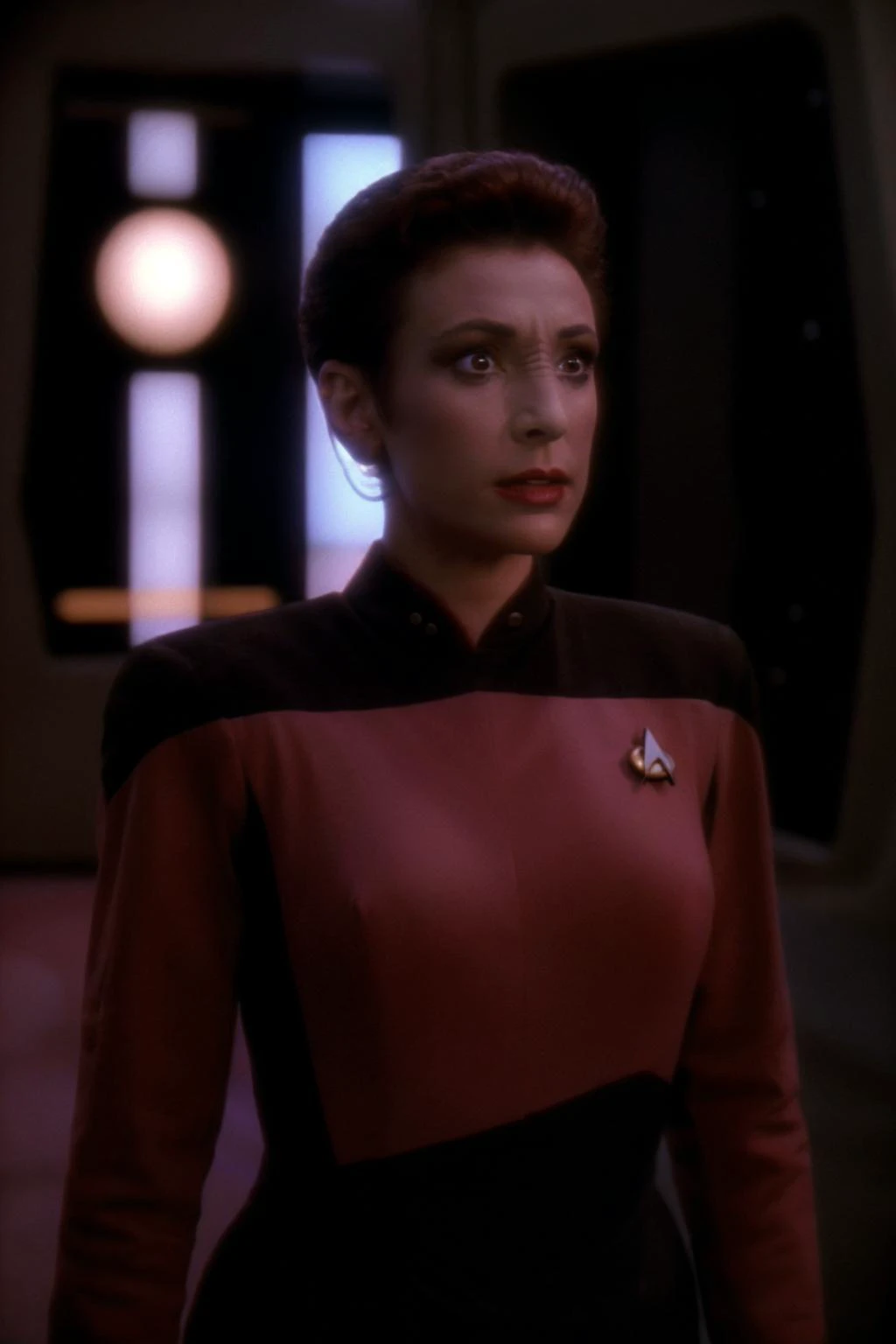 cinematic still of a woman wearing s3stngunf uniform, kiranerys, ds9background, sharp focus, uhd, on the enterprise <lora:kiranerys:0.8> <lora:STNGV3new:1>
