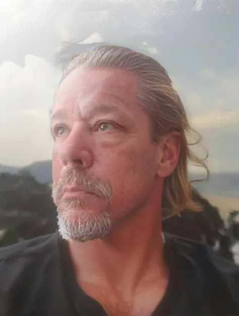 ((((BAD ASS Rugged Photographer)))), beach surfer , Strong jaw, great hair, war photographer self portrait of famous photographer deep in thought self portrait, perfect lighting, 3 point lighting, high contrast, studio lighting, photo by Canon R5 for sport illustrated, vogue