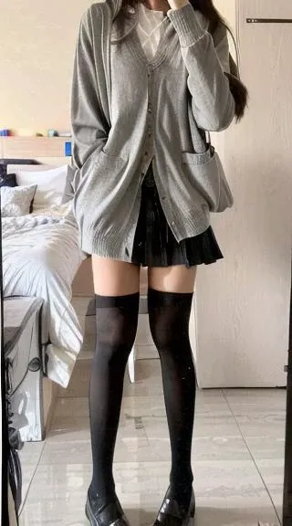 masterpiece, (photorealistic:1.2), beautiful lighting,
, black thigh highs, black skirt, white shirt, cardigan <lora:jyzjk:1>, full body pic,