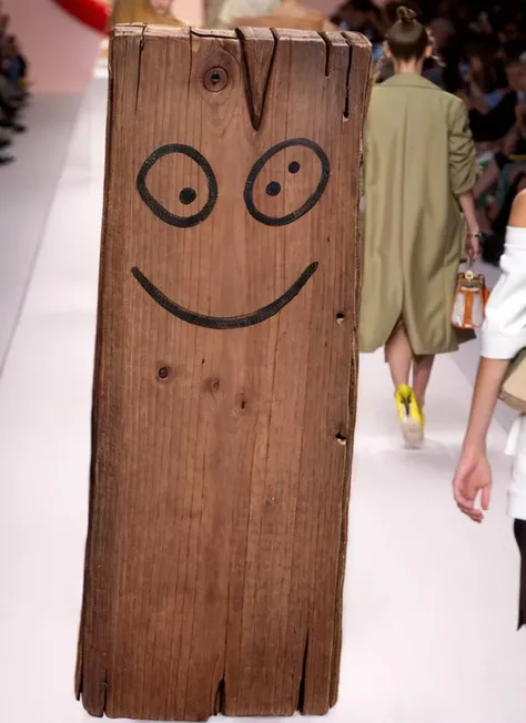 a (smiling:1.2) light brown evil plank on the fashion runway, <lora:Plank:1.1>