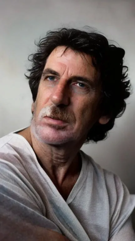 ((best quality)), ((masterpiece)), ((realistic)), A striking portrait photo showcasing a man (g4rcia:1), taken in a studio setting. The lighting should be dramatic, with directional light casting interesting shadows. The artwork should be created in the style of Annie Leibovitz, using photography as the medium. The color scheme should be black and white, with high contrast, accentuating the subject's features. It should be a high-definition portrait. on eye level, scenic, masterpiece. <lora:g4rcia:1> <lyco:locon_perfecteyes_v1_from_v1_64_32:0.8> <lora:painted clothes5:1> <lora:add_detail:1>
